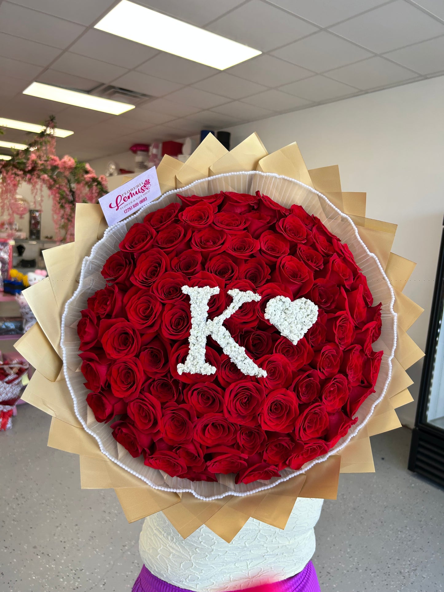70 roses with letter filled with baby breath